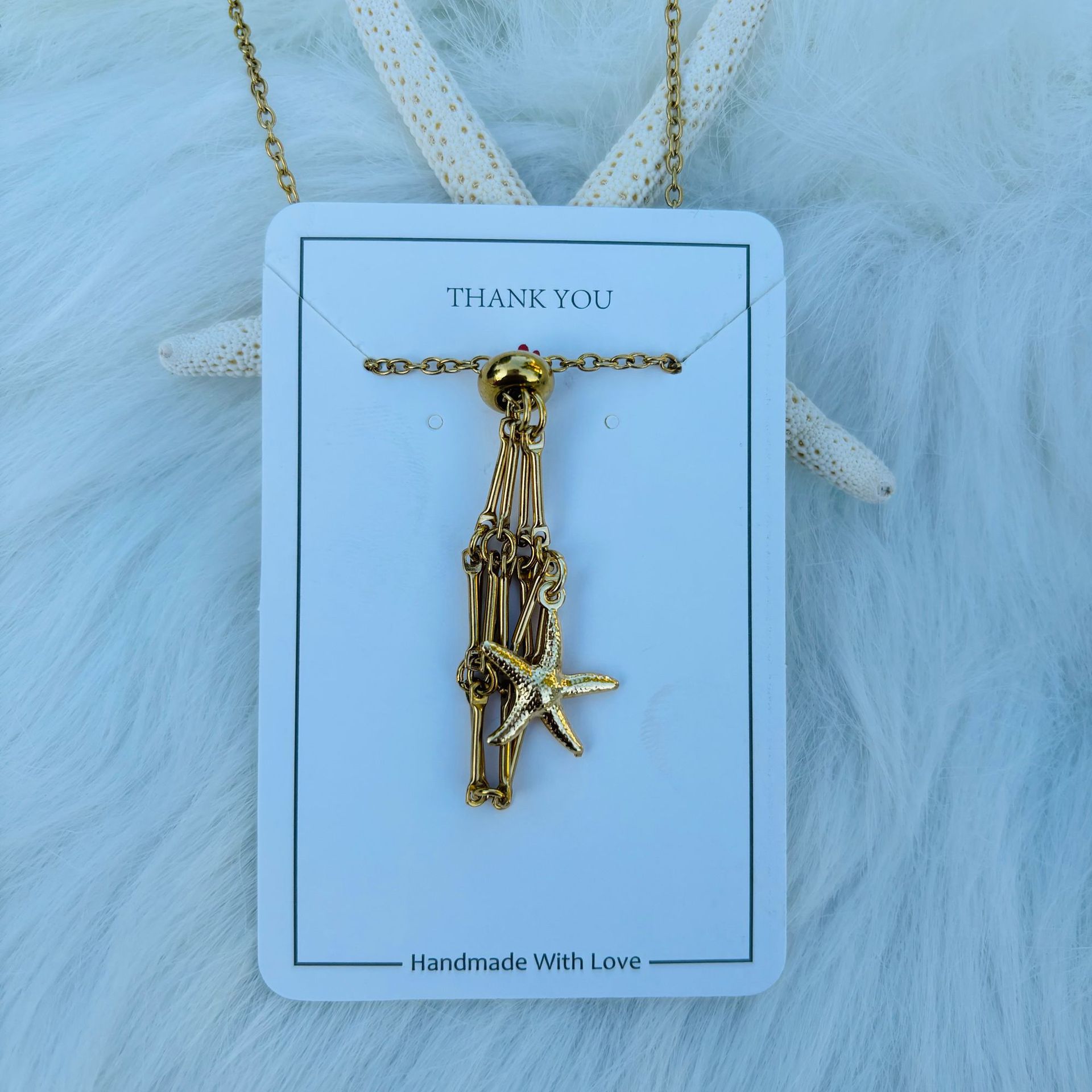 Steel gold plated S hanging starfish