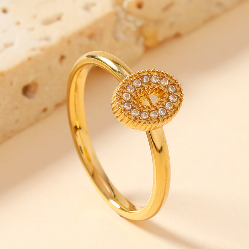 Diamond-encrusted oval ring