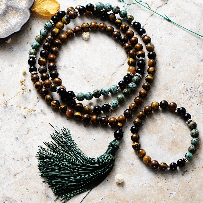 A tiger-eye necklace and bracelet