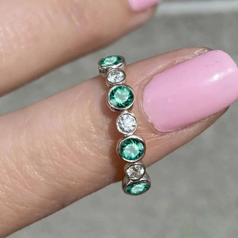 White gold   green stone