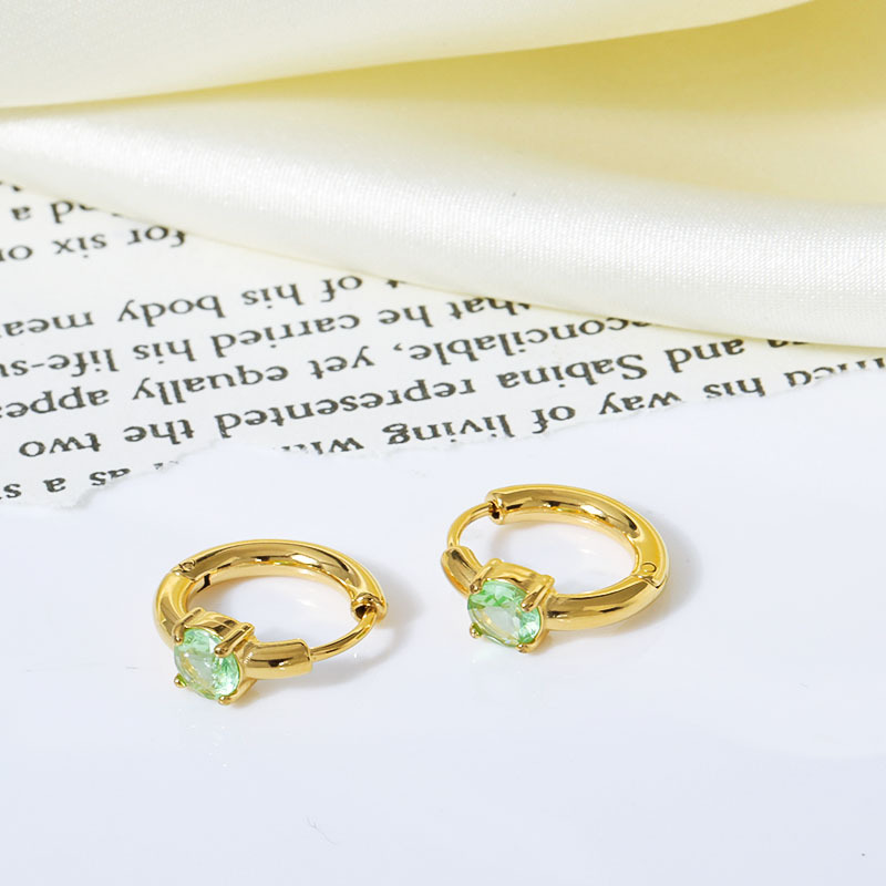 Gold inlaid green zircon