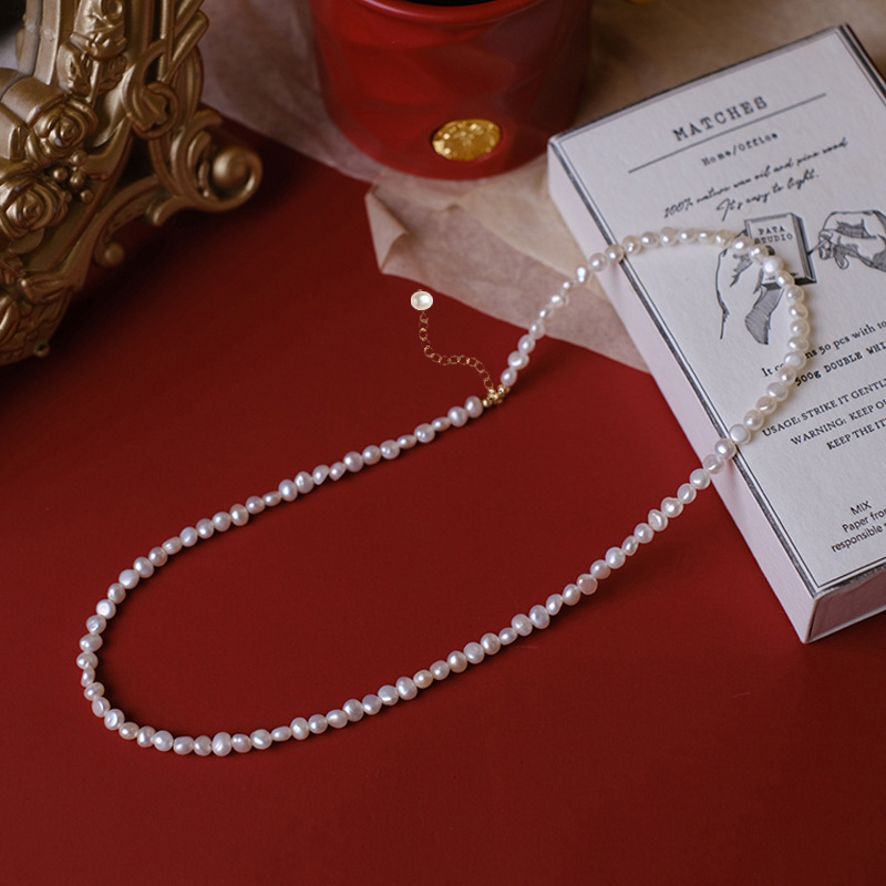 Single 5-6mm diameter pearl necklace