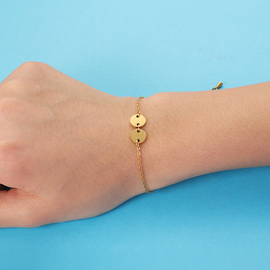 Gold bracelet (two discs)