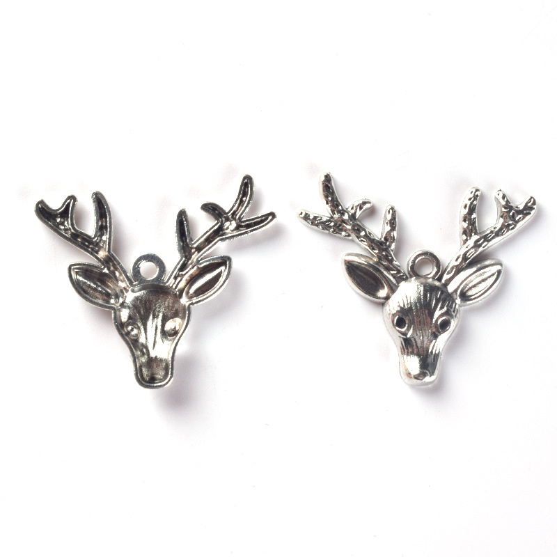 Antique silver deer head