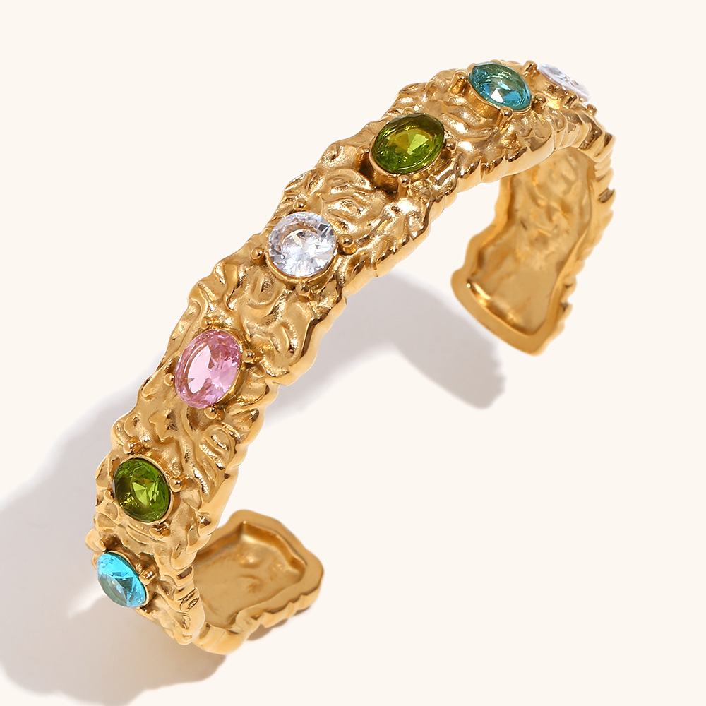 Irregular deep colored diamond cast bracelet-gold color