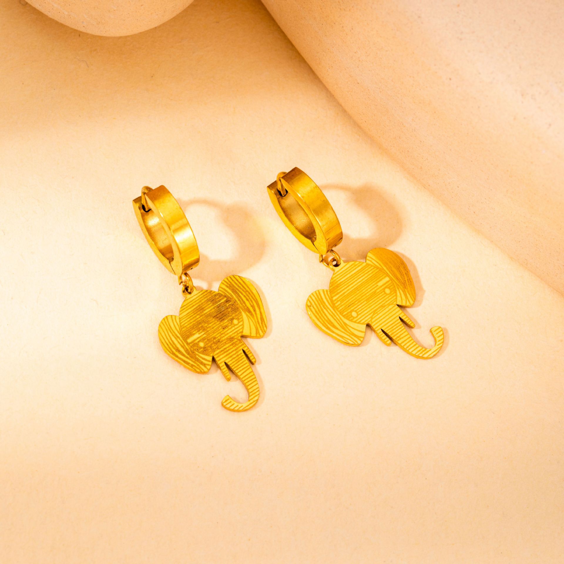 Gold elephant earrings