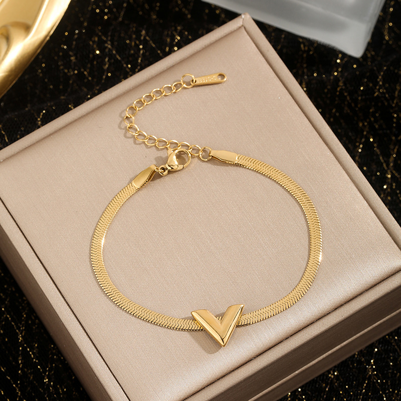 Letter v bracelet gold