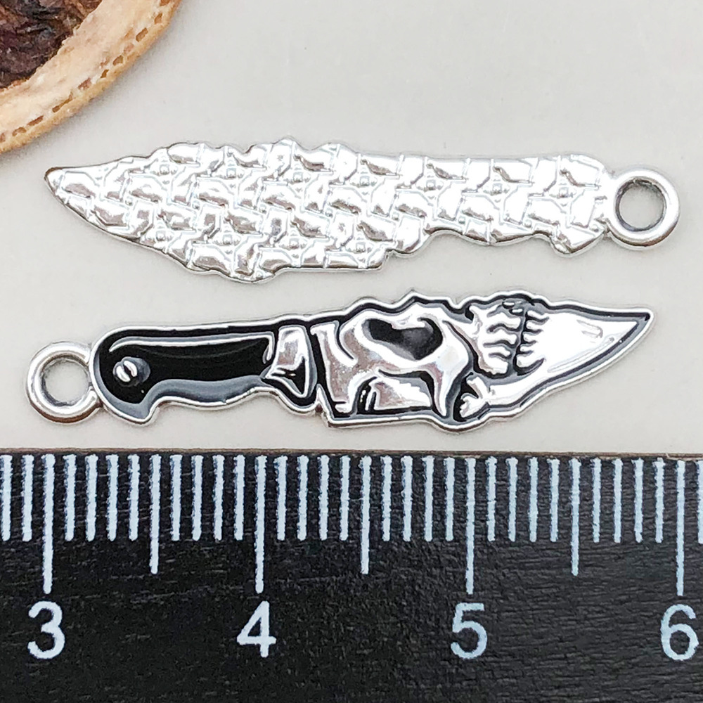 1 black oil dripping halloween skull dagger 31*7mm-0.9g-19392