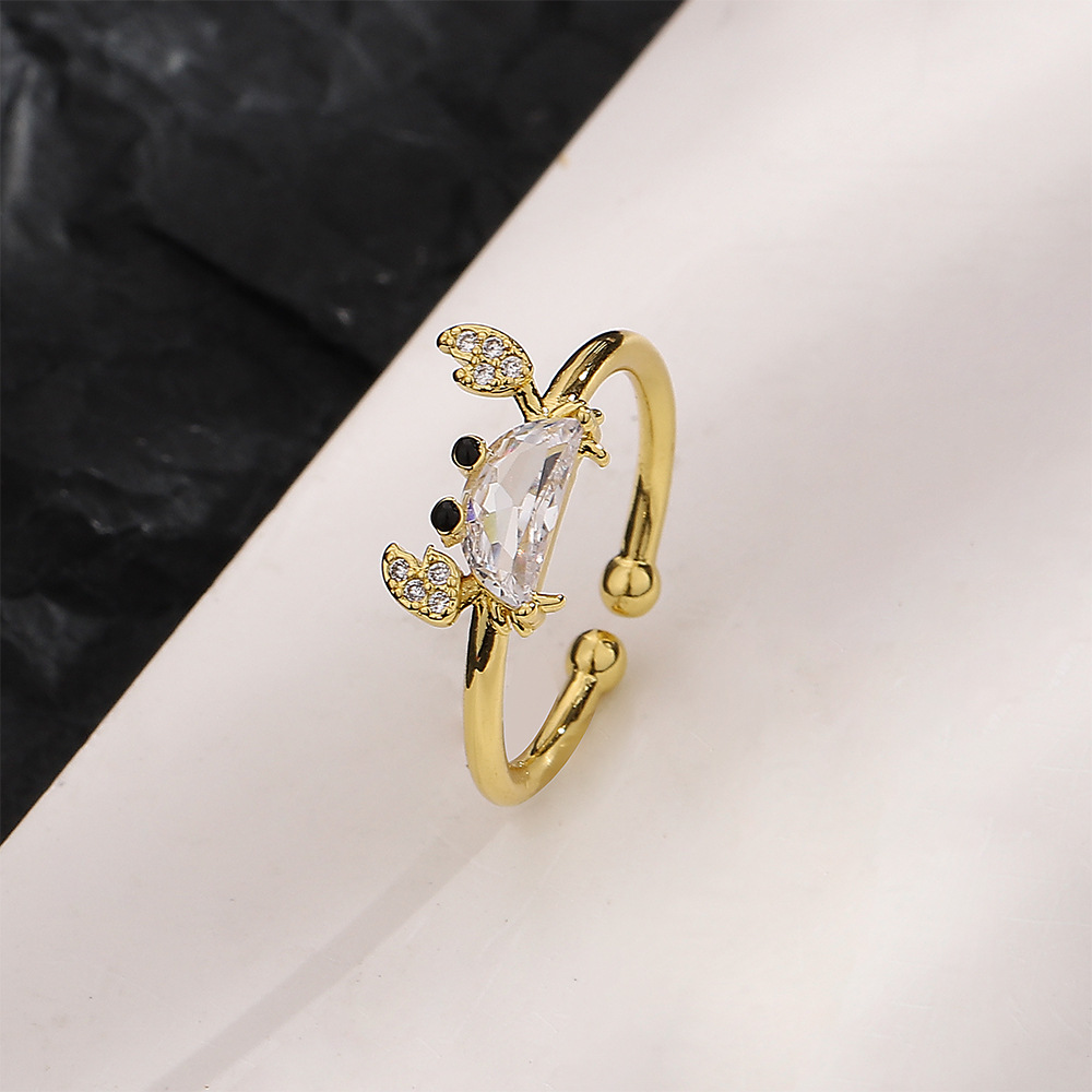 Golden zircon crab ring