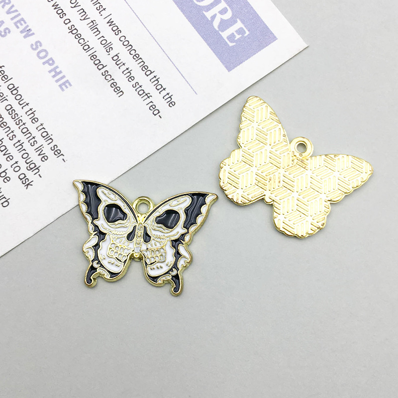 1 oil dripping skull butterfly 25*18mm-2g-17263