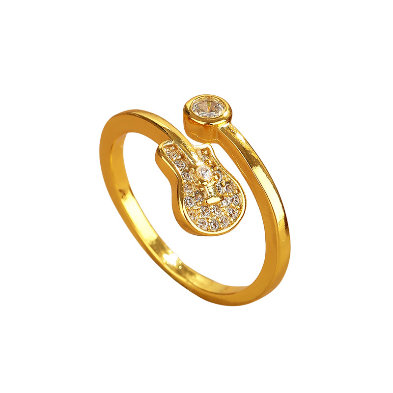 Gold zircon guitar ring