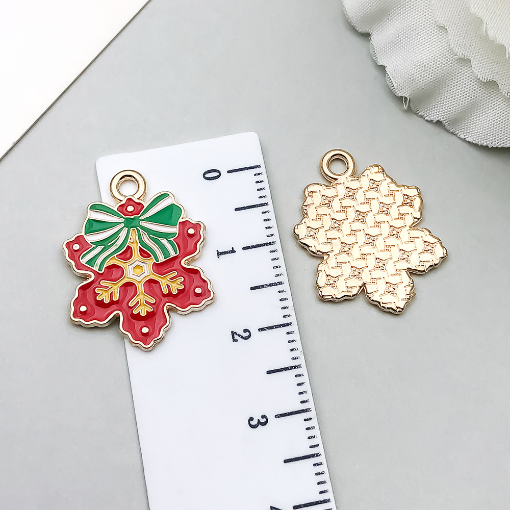 1 red dripping oil christmas bow snowflake 22*17mm-1.3g-19682