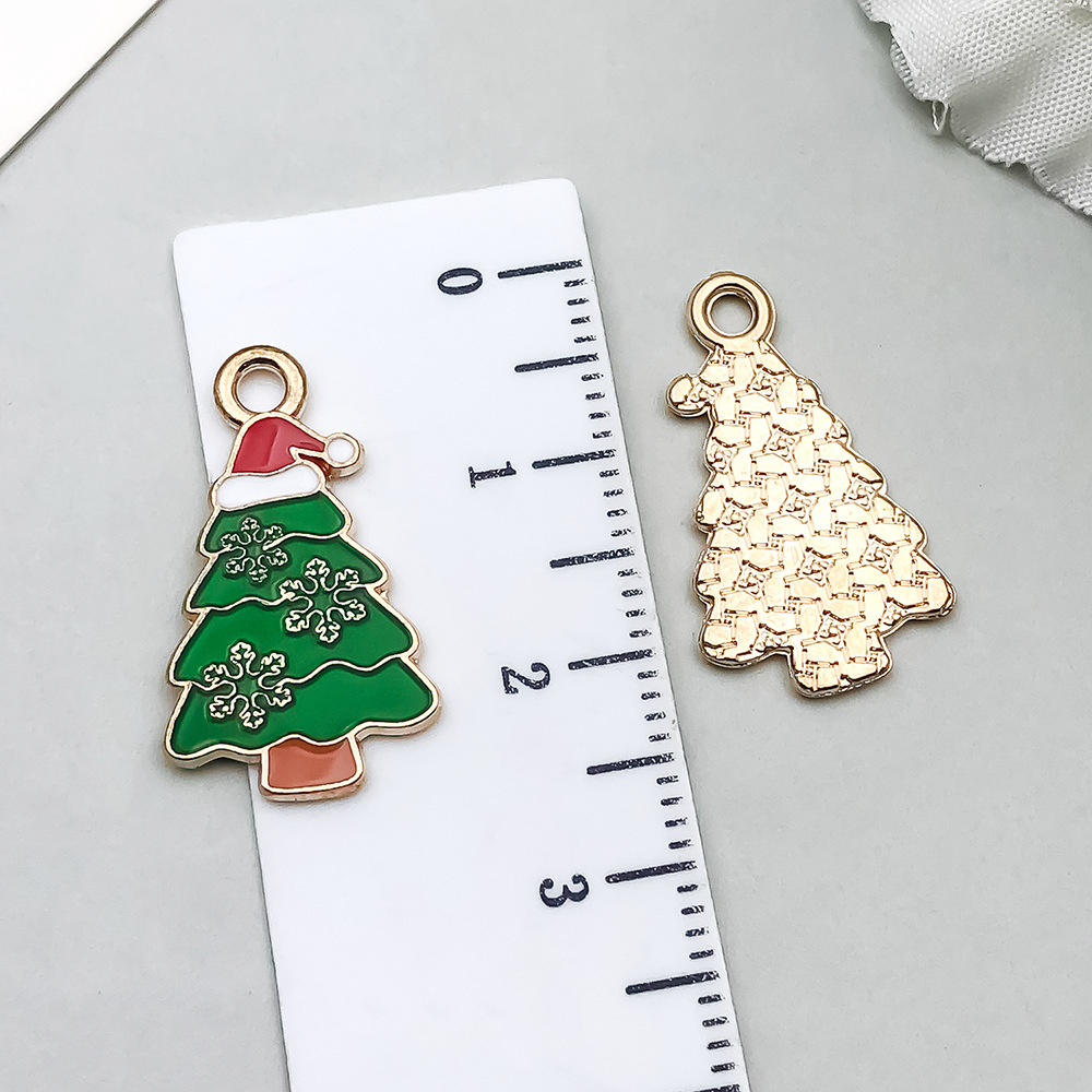 1 green dripping oil christmas tree 22*13mm-0.9g-19686