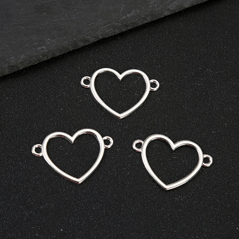 Hollow love (about length: 3.9cm width: 2.7cm thickness: 0.15cm)