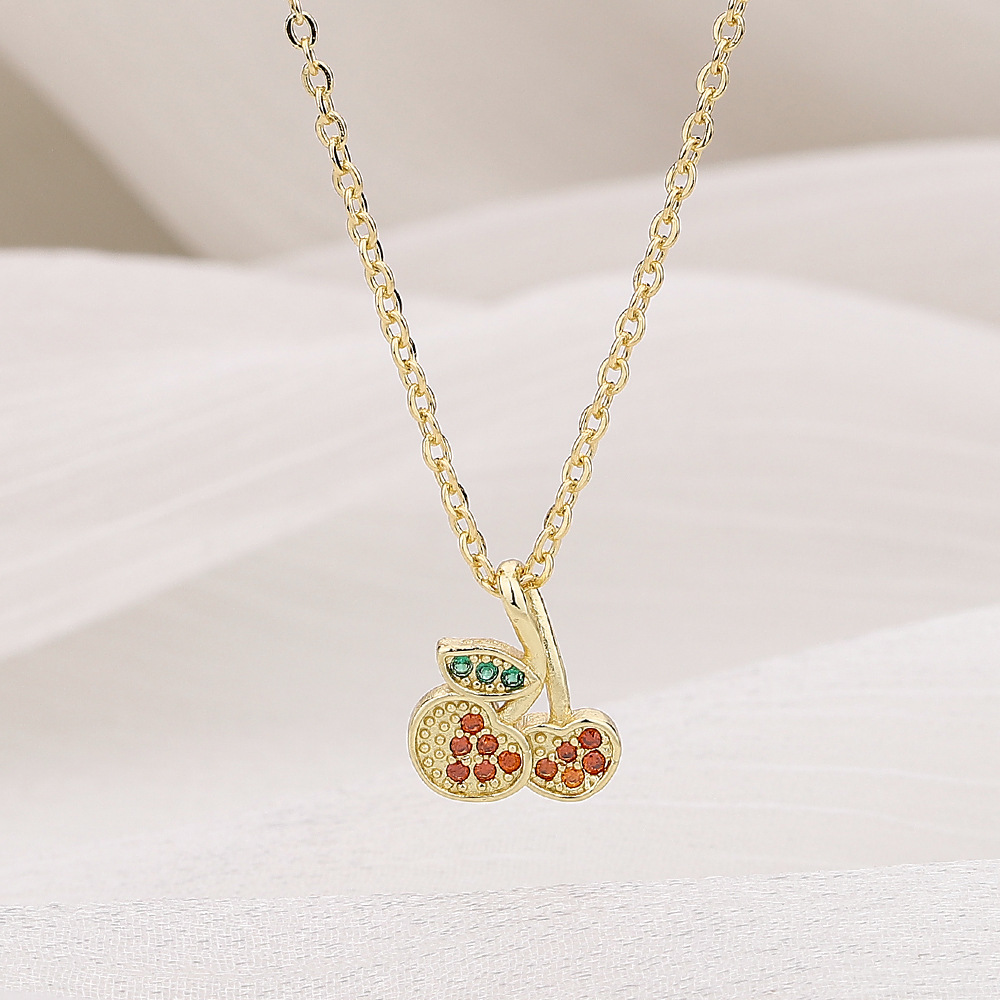 Gold cherry necklace