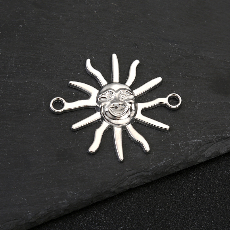 Silver sun (about 8*7.7*0.3cm)