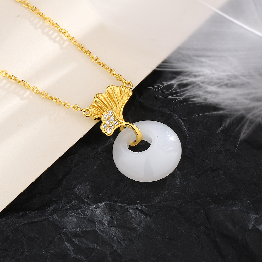 White jade sansheng has apricot necklace (gold color)