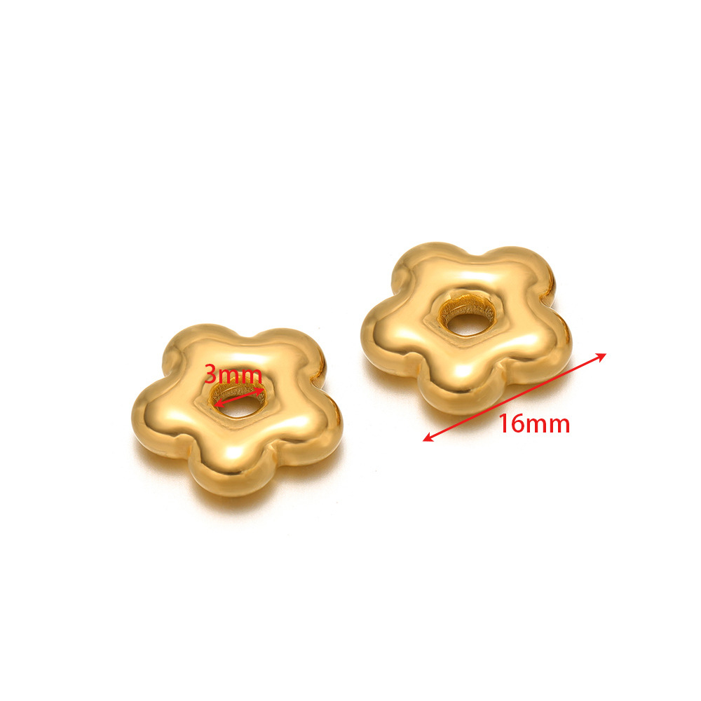 16mm wide oil embossed flower with 3mm holes in gold