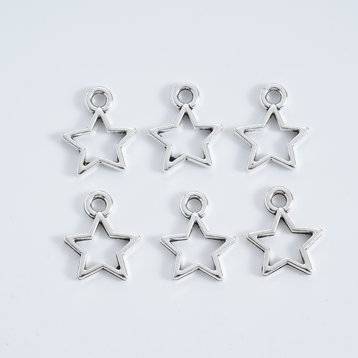 Five-pointed star 13x10.5x1.5mm ancient silver