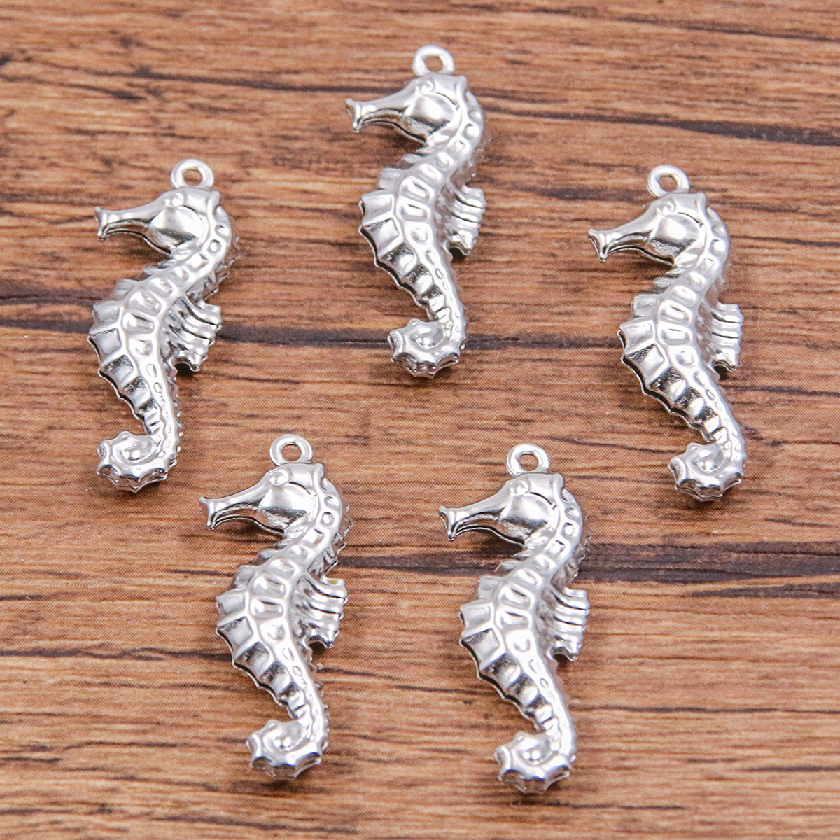 Steel color seahorse 10x26mm