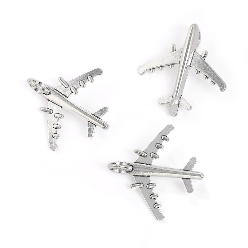 antique silver aircraft 37×38mm6.4g