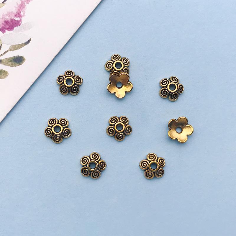 1 antique gold flower-shaped flower hat 6*6 holes 1.1 mm-16601-0.2g