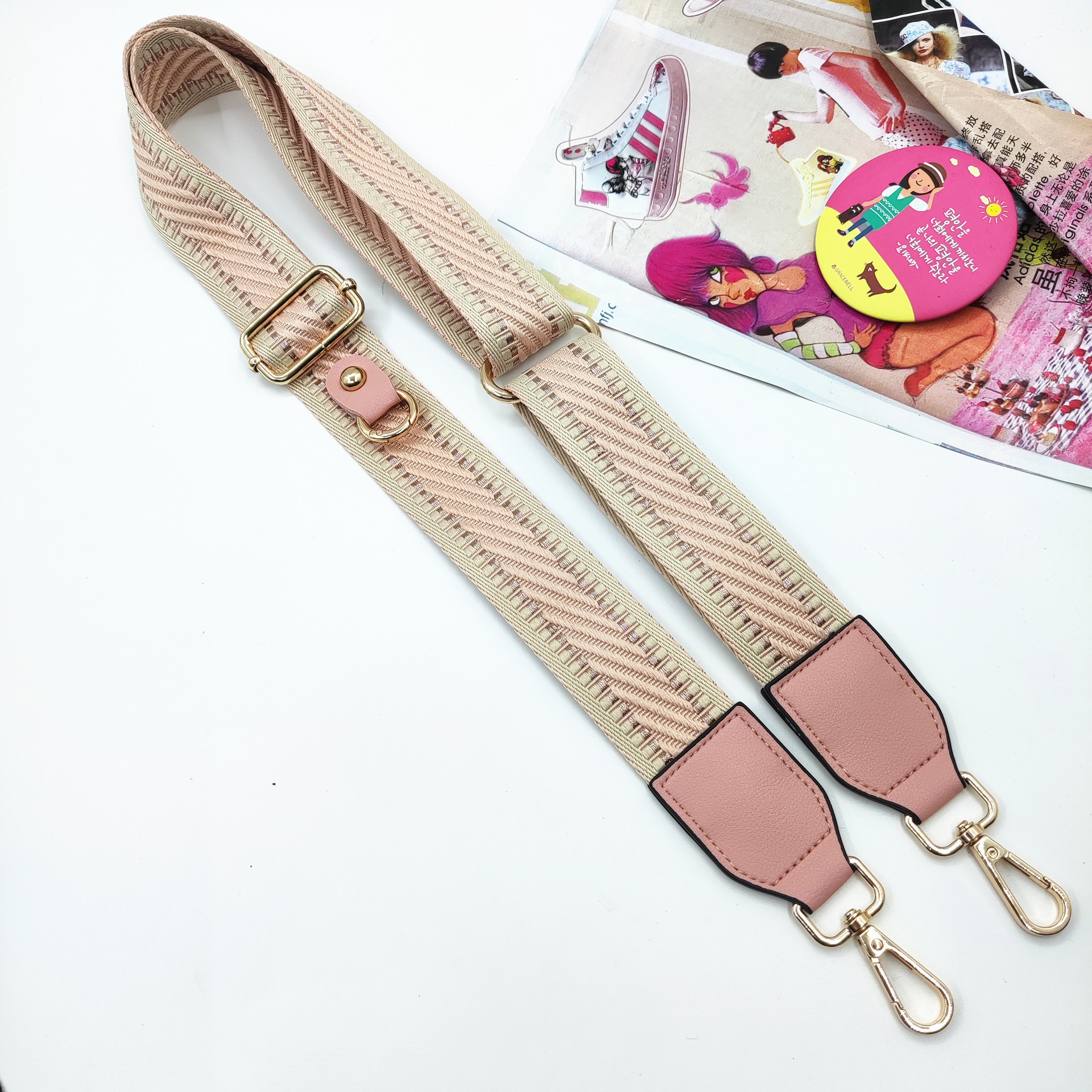 Diagonal pink shoulder strap