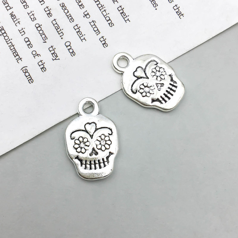 1 antique silver skull 12*18mm-1.9g-10874