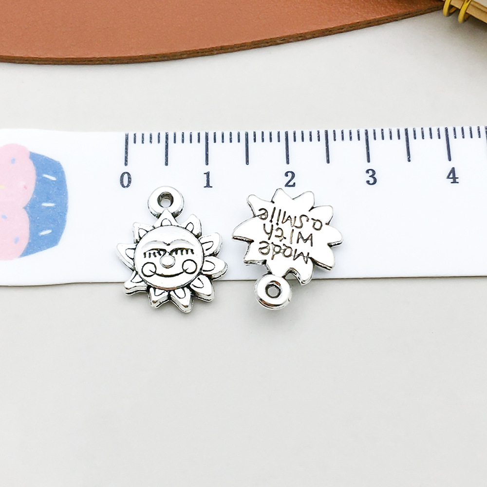 1 antique silver sun 13*17mm-1.4g-10935