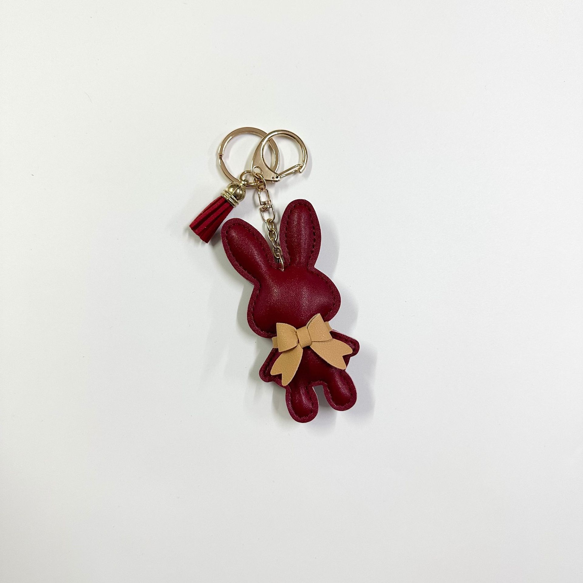 Wine red rabbit with button tassel