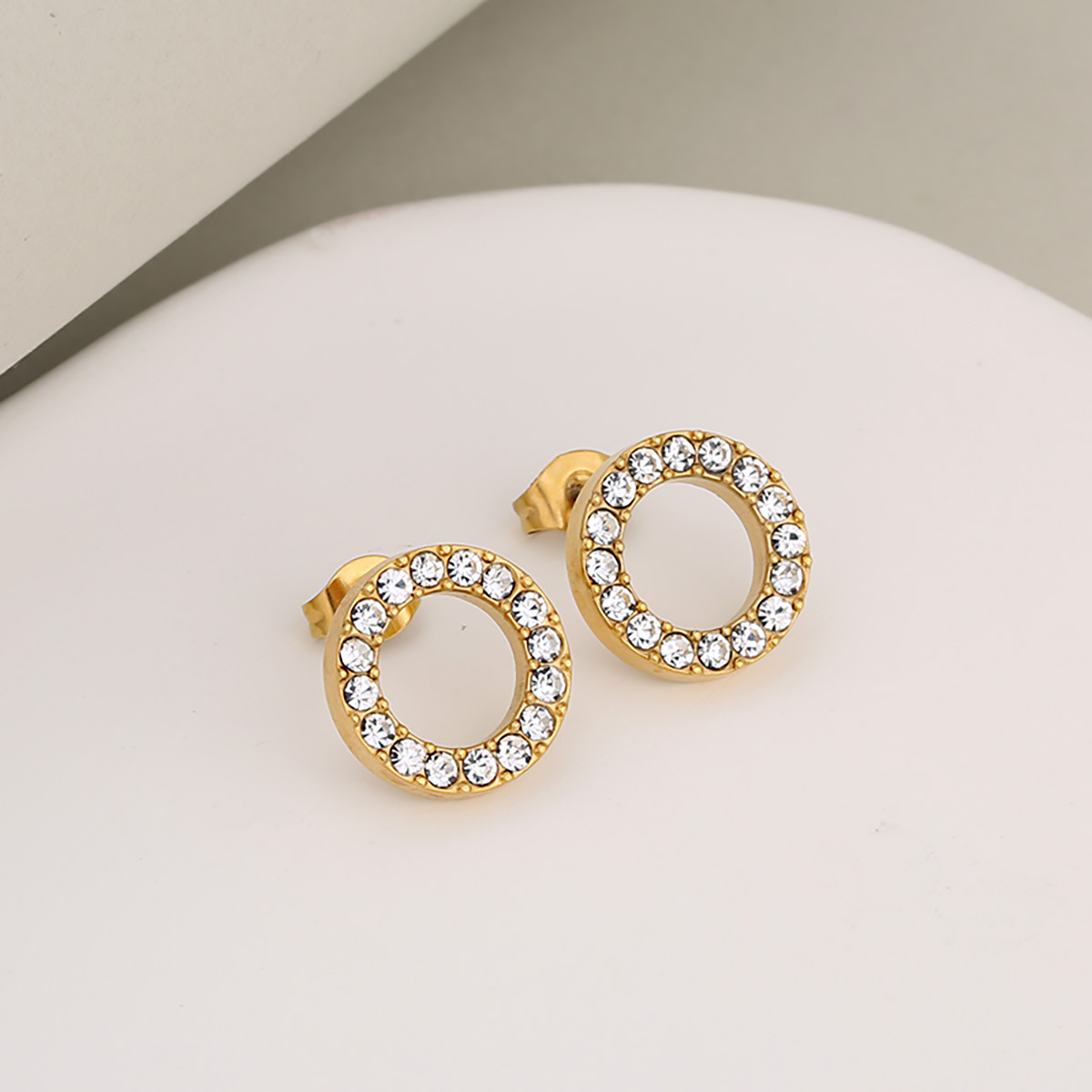 Gold   white stone (earrings)