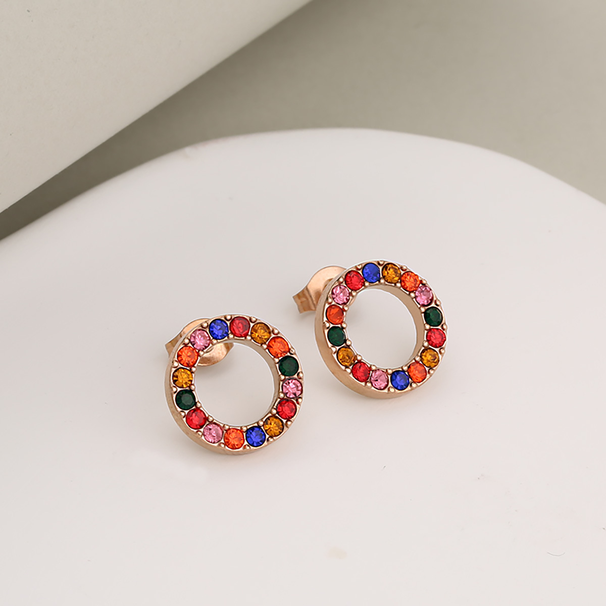 Rose gold   colored stone (earrings)