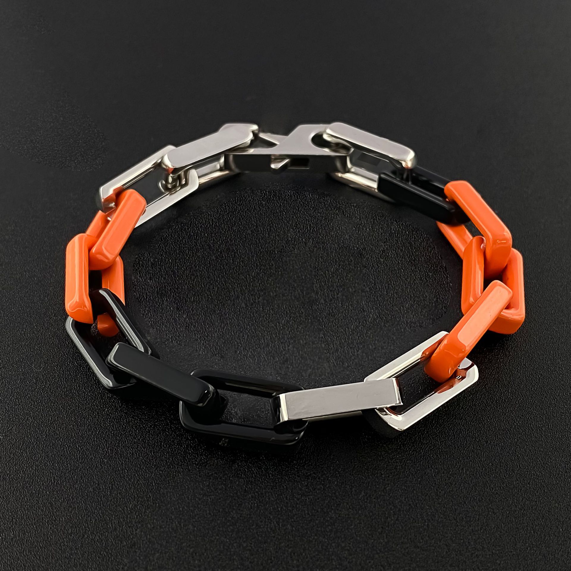 Orange and black steel bracelet