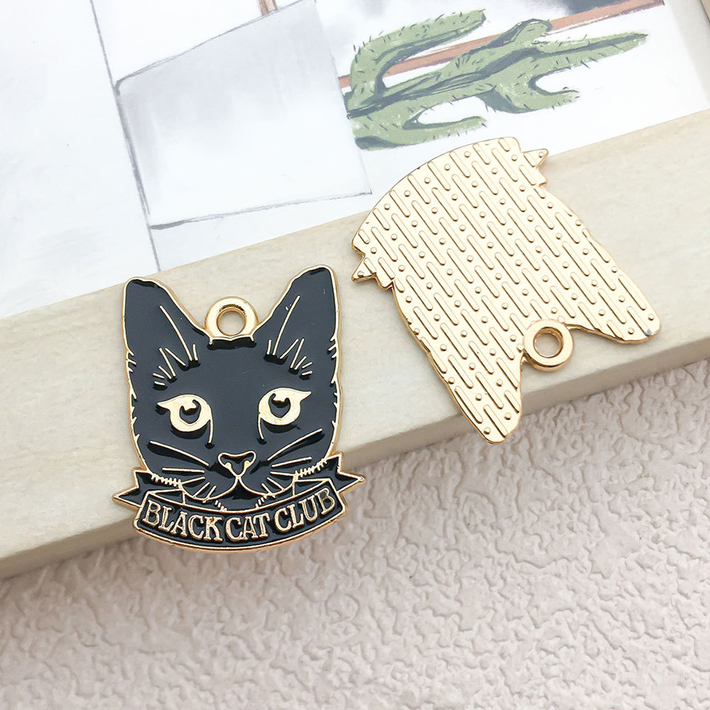 1 black English cat head 21x24mm-2.5g-18085