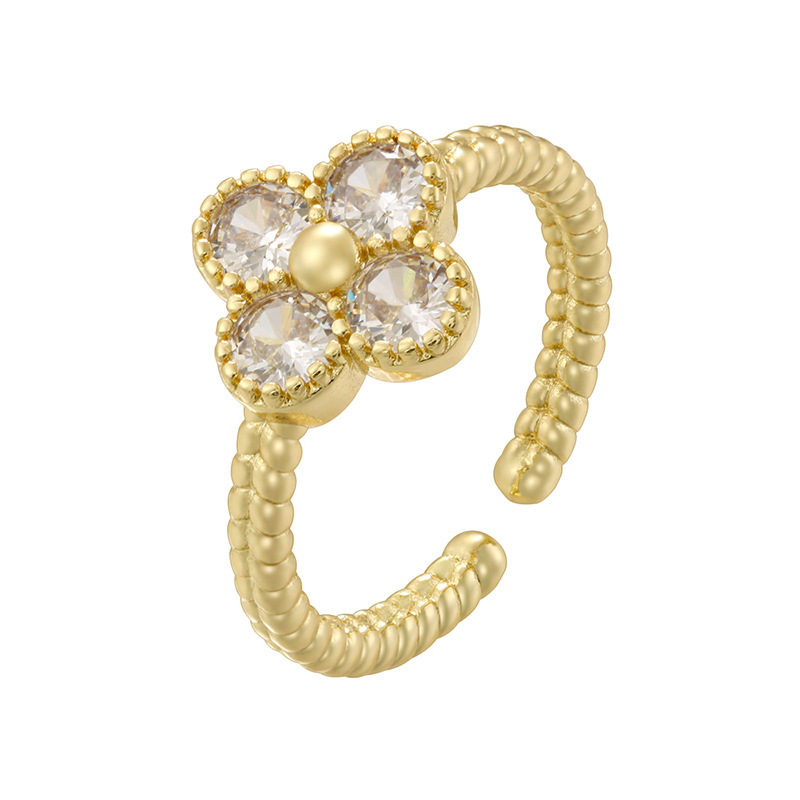 Golden white diamond twist edge four-leaf clover ring