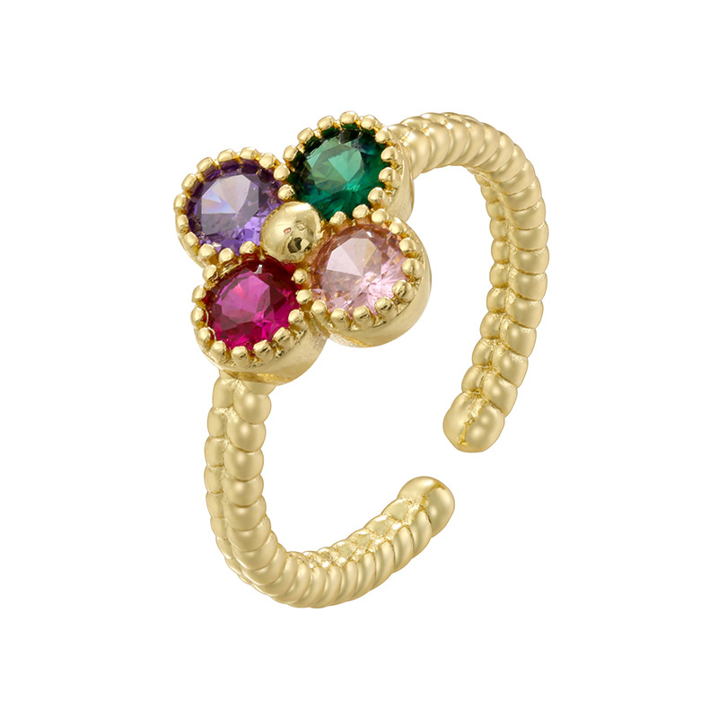 Gold colored diamond twist edge four-leaf clover ring