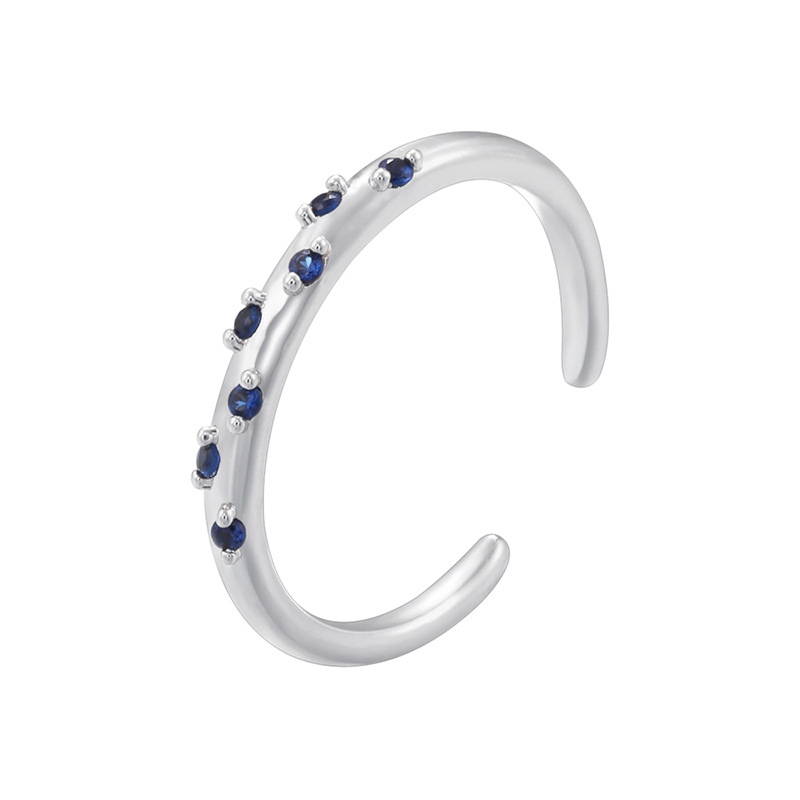 White gold blue diamond ring