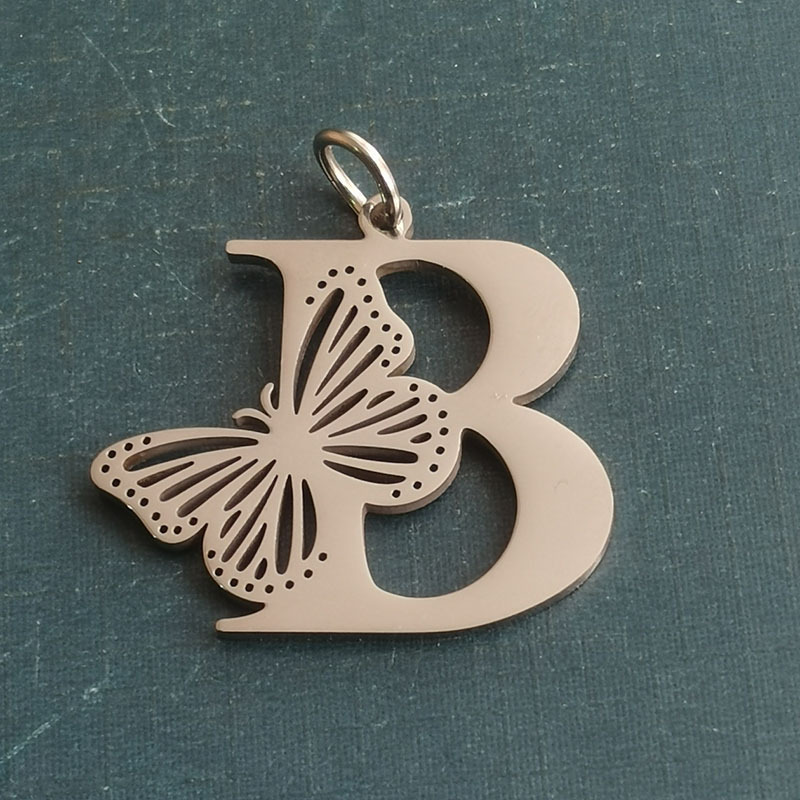 B silver pendant