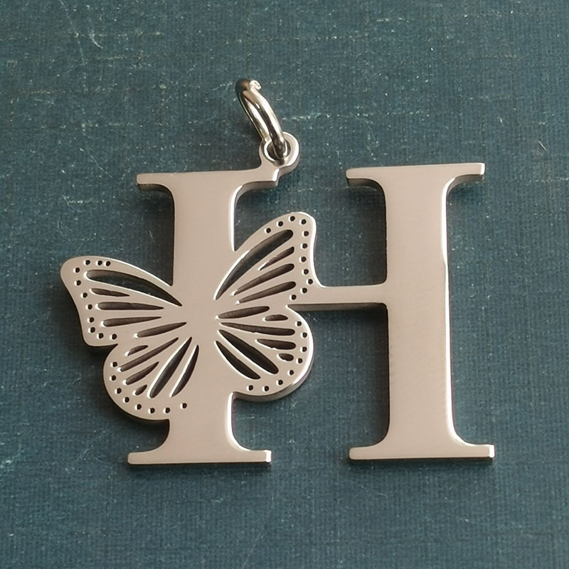 H silver pendant