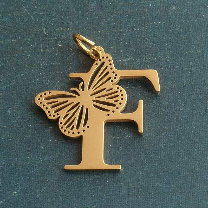 F gold pendant