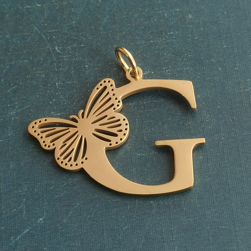 G gold pendant