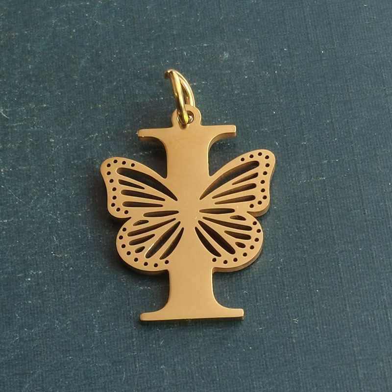 I gold pendant