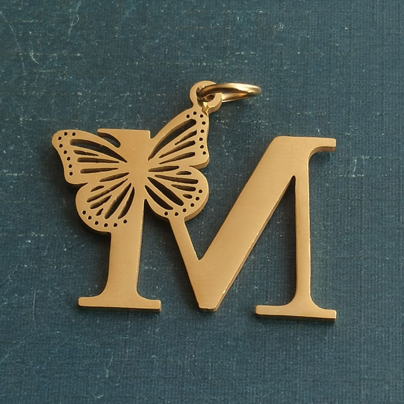 M gold pendant