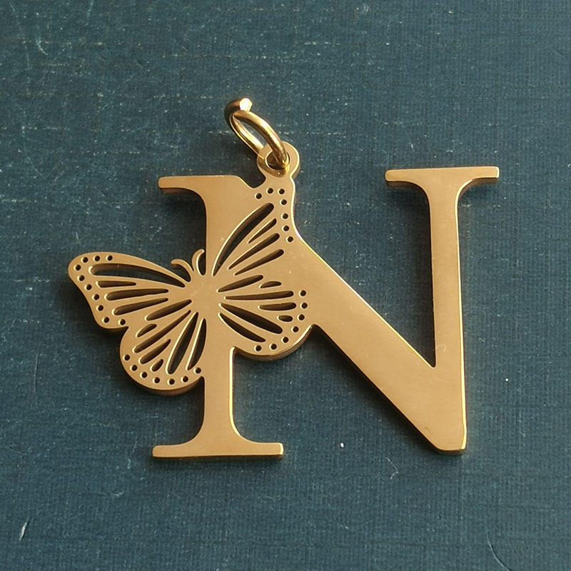 N gold pendant