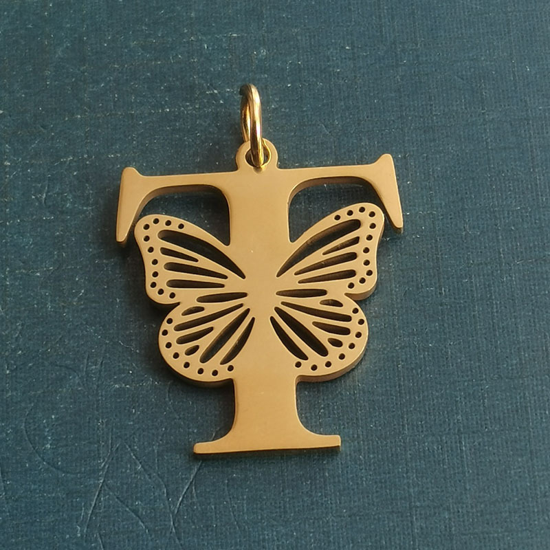 T gold pendant