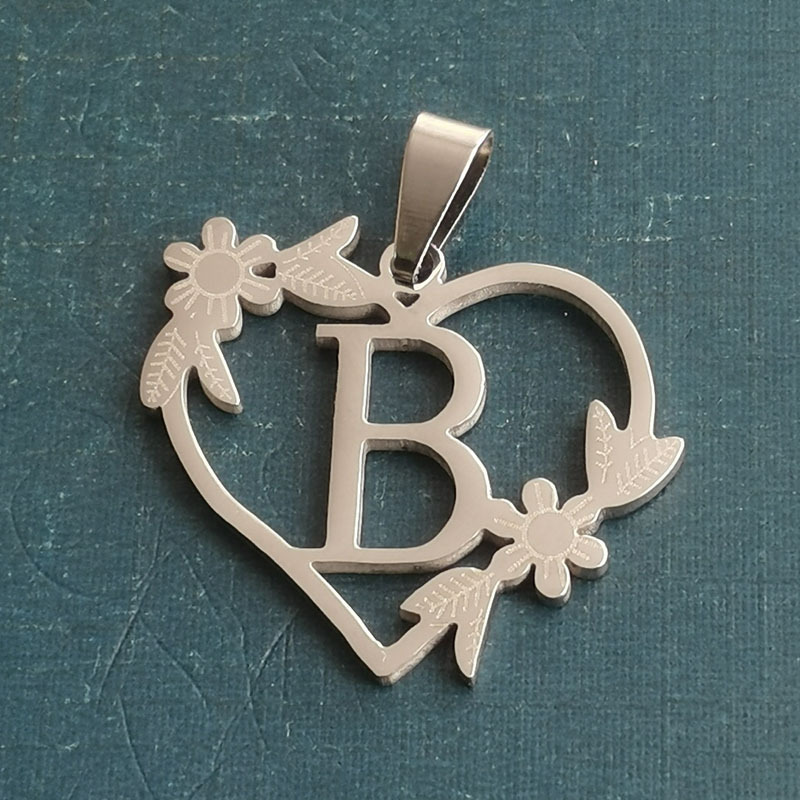 B silver pendant