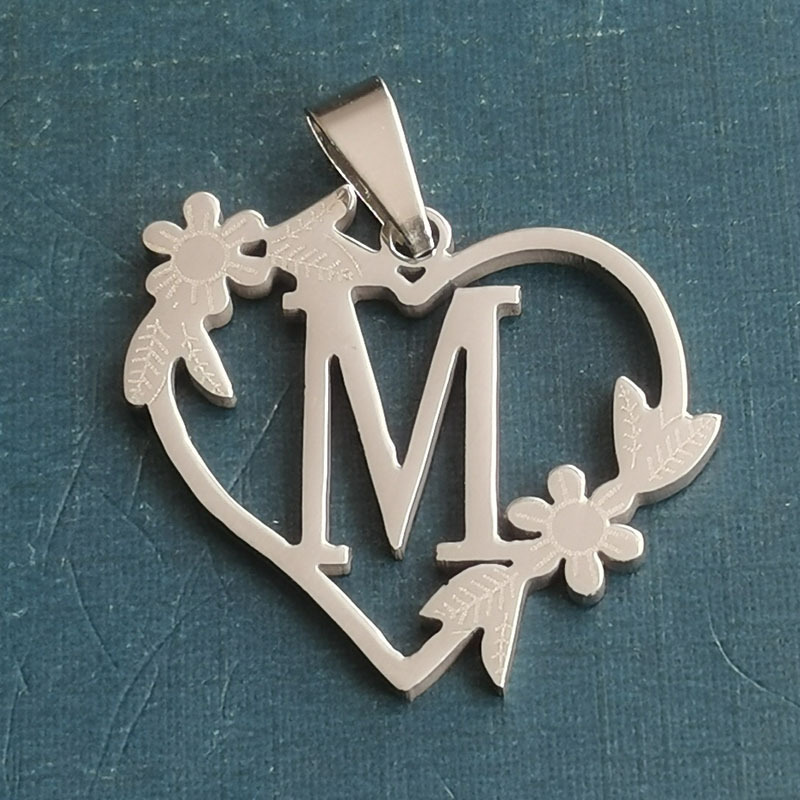 M silver pendant