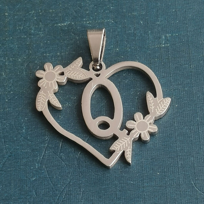 Q silver pendant