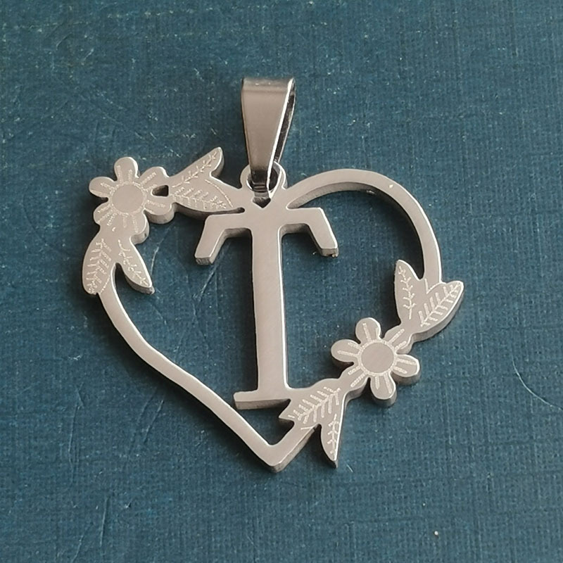 T silver pendant