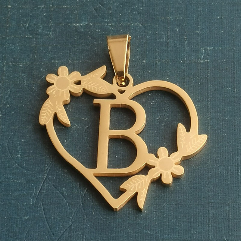 B gold pendant